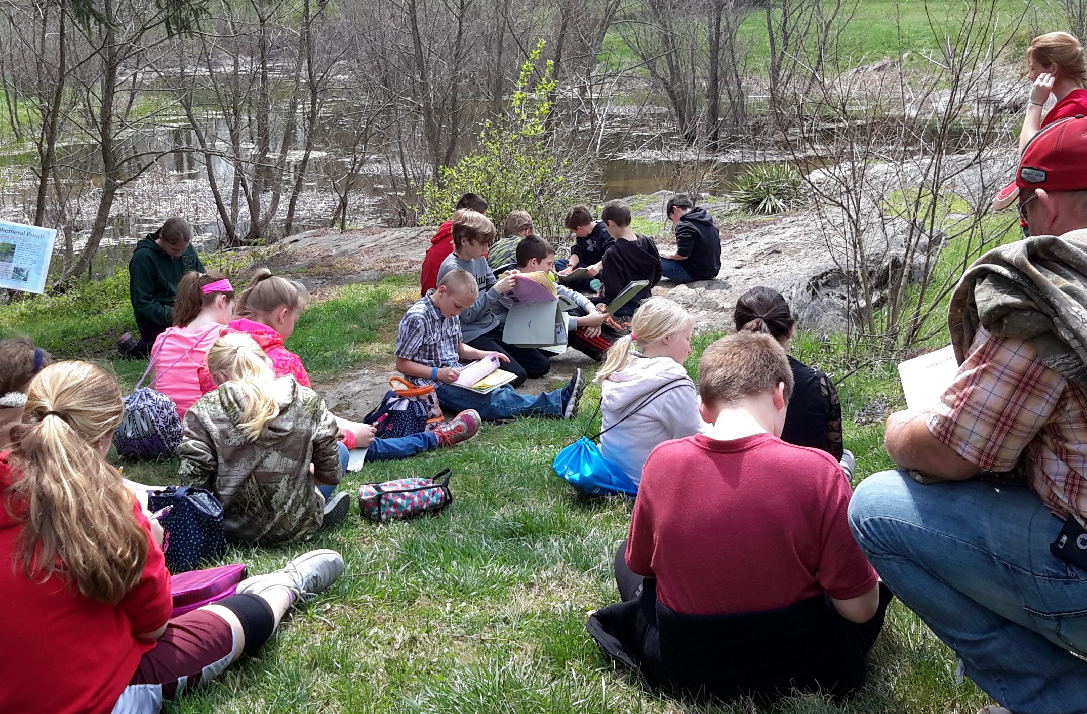 Students study watershed health as they conduct a site analysis at Lake Georgette