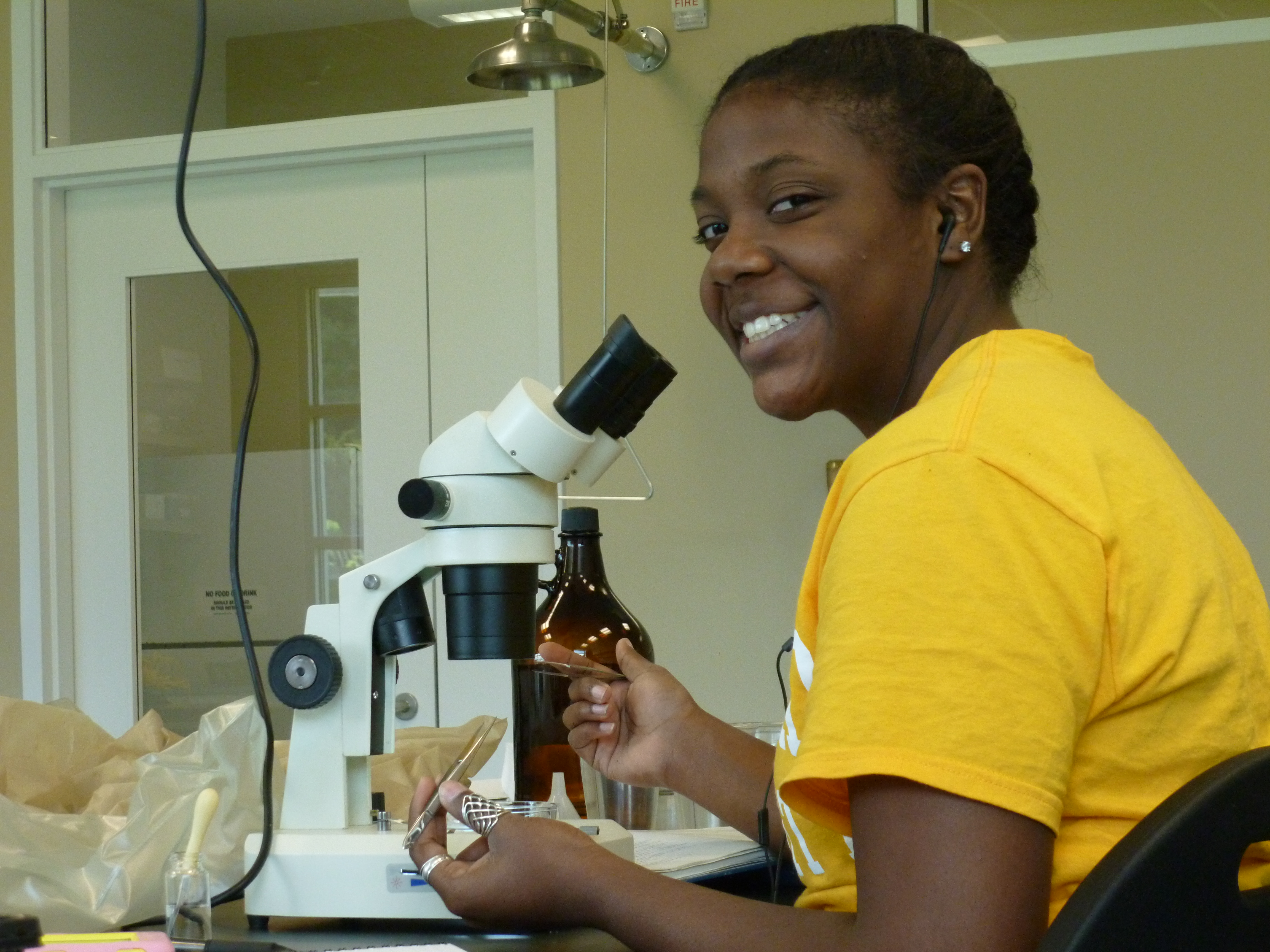 Picture of student at microscope